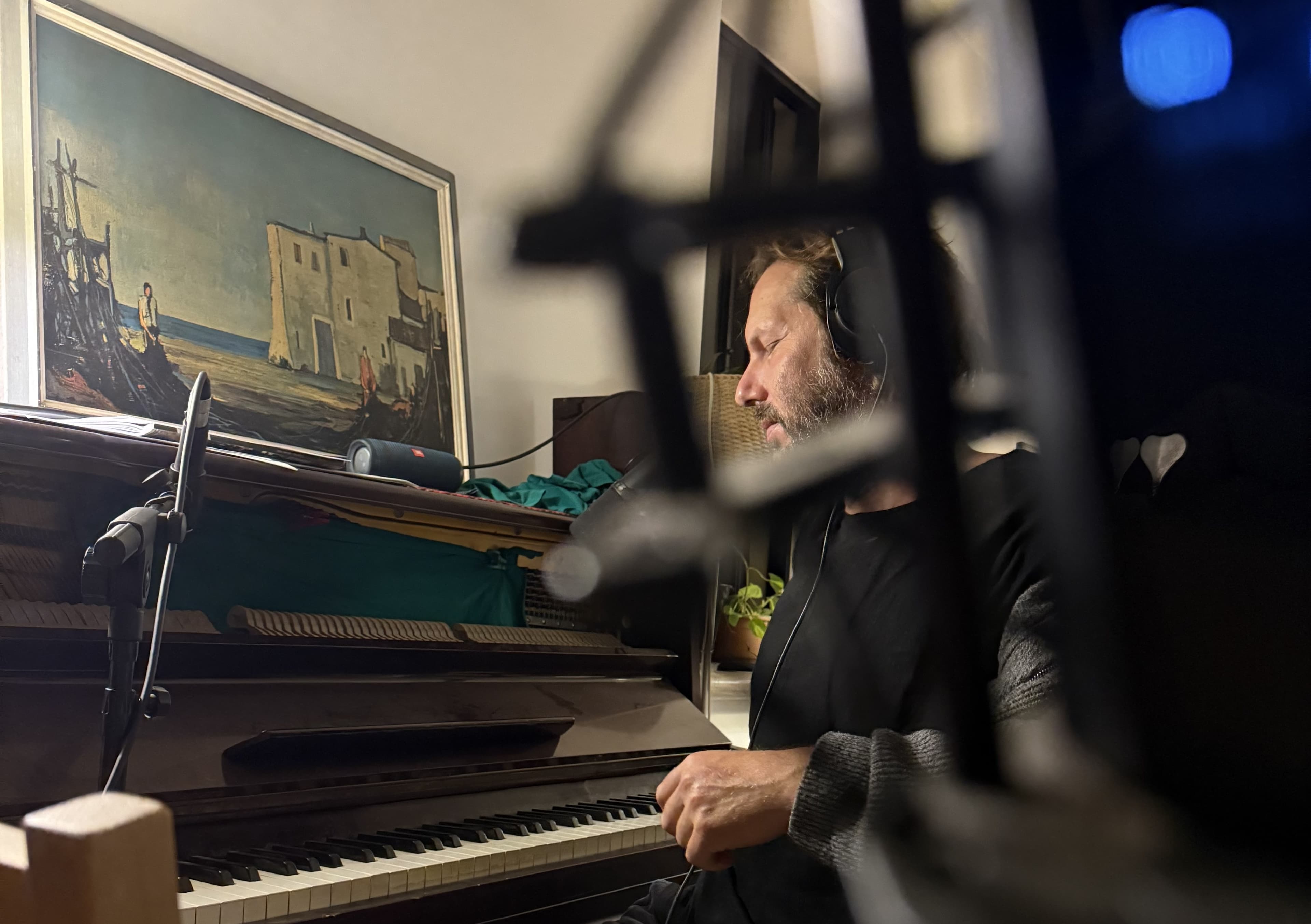 Yoav composing in the studio
